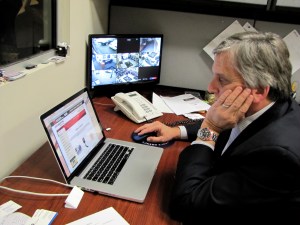 Professional Investigator and Spy Shops USA owner Mark Ford works on the company’s website. While the company is local, the site is wholesale and sells to other suppliers. PHOTO/STEPHANIE SOKOL