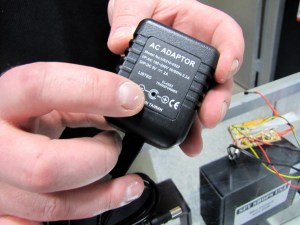 A popular item is the AC Adaptor camera, which plugs into the wall and holds a standard SD card. Kaye said he can install nanny cams into a variety of household objects, to fit into a natural setting. PHOTO/STEPHANIE SOKOL